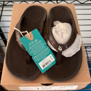 OluKai Kulapa Kai in Dark Java. Size 7.  Brand New in box.